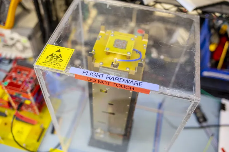 HuskySat-1 sits under protection in the UW satellite lab in June, as it prepared to leave on its journey to Virginia and then to low-Earth orbit. Dennis Wise/University of Washington